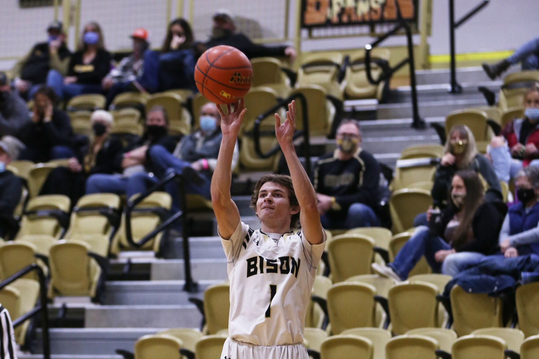 Kollen Milmine attempts a three point shot
